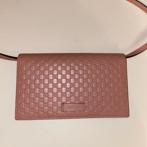 Pink Gucci cross body wallet
